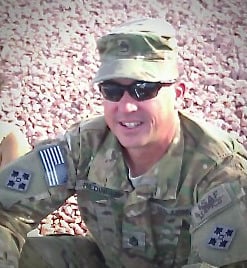 owner Christopher Riedinger in military uniform